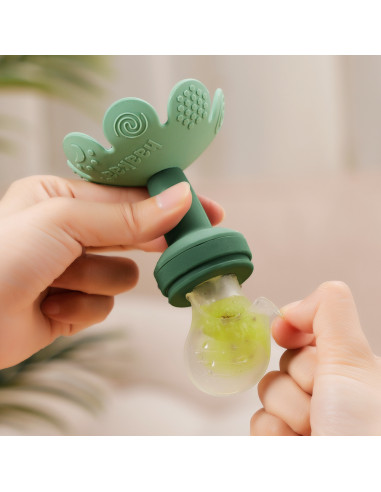 Blumenförmiger Fruchtsauger und Gefrierhülle...